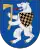 A coat of arms depicting an angry, grey bear with yellow claws and a long, red tongue gripping a yellow axe in its paws all on a blue background