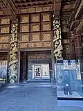Gold-dragon decor replicas on the beams and eaves of Cixi's above-ground memorial hall; the originals were torn-down and stolen during the 1928 looting.