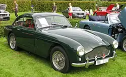 Green, low-slung sports car