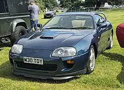 European specification model with bonnet scoop, headlights washer and OEM active front lip[34] (pre-facelift)