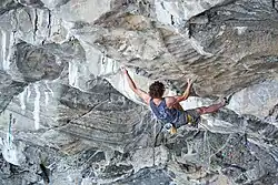 Czeh climber Adam Ondra on the climb known as Silence, the world's first 9c (French), 5.15d (American YDS), and XII+ (UIAA) graded lead climb