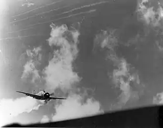 Special attack pilot Lieutenant Yoshinori Yamaguchi's Yokosuka D4Y diving at the carrier USS Essex, 25 November 1944.