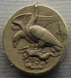Ancient Greek tetradrachm coin, 410 BC, with grasshopper at right