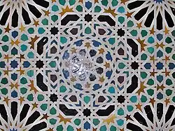 Eight-pointed and sixteen-pointed star motifs in zellij (azelujos) tilework at the Sala del Mexuar in the Alhambra in Granada, Spain (14th century)[105]