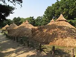 Reconstructed Neolithic-period huts in Amsa-dong, Gangdong District, Seoul