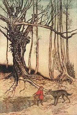 Illustration by Arthur Rackham depicting Little Red Riding Hood standing in a forest with a wolf, near a tree and a path.