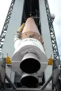 Core stage of an Atlas V being raised to a vertical position in preparation of launch of MRO