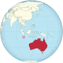 Location of Christmas Island (red circle) and the location of the Australian mainland (continent in red)