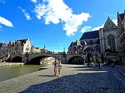 Saint Michael' bridge over the Lys (Leie) river and Saint Michael' church