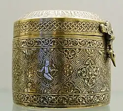 Room 34 – Cylindrical lidded box with an Arabic inscription recording its manufacture for the ruler of Mosul, Badr al-Din Lu'lu', Iraq, c. 1233 – 1259 AD