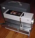 Model D 40 straight tray slide projector (1961)[d][nb 1]