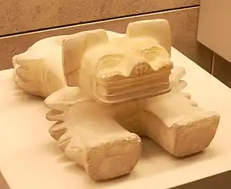 Alabaster statue of an ocelot from Teotihuacan, 5th–6th centuries, possibly a ritual container to receive sacrificed human hearts (British Museum)[130]