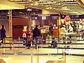 Juxtaposed immigration controls at Brussel-Zuid/Bruxelles-Midi railway station, with the Belgian Federal Police carrying out exit immigration checks from the Schengen Area in front, and the UK Border Force carrying UK entry immigration checks behind