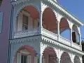 Gingerbread trim on an 1882 house in Cape May, New Jersey[18][19]