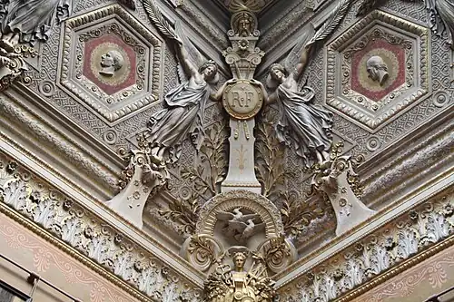 Neoclassical sculpted decoration on the ceiling of the Salon des Sept cheminées, Louvre Palace, Paris, by Francisque Duret, 1851[51]