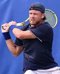 Christian Harrison was part of the 2026 winning men's doubles team.