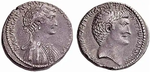 A silver coin depicting the heads of Cleopatra and Mark Antony