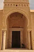 Close view of one of the entrances of the west facade
