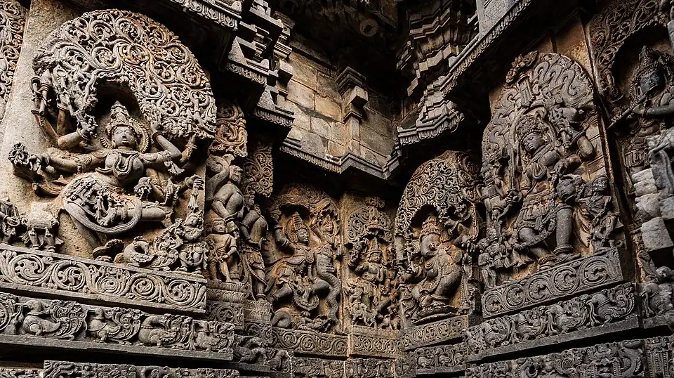 Exterior wall reliefs at Hoysaleswara Temple. The temple was twice sacked and plundered by the Delhi Sultanate.[257]