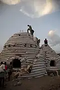 Eco-Dome[48] sandbag shelter under construction in Djibouti