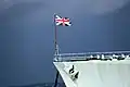 Union Jack flying from the jackstaff of a Royal Navy vessel