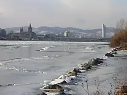 View upstream from the Donauinsel in Vienna, Austria, during an unusually cold winter (February 2006), as the river rarely freezes there[citation needed]