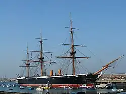 A picture of the iron-clad HMS Warrior docked in Portsmouth's historic harbour. The ship has since been restored to its original Victorian condition.