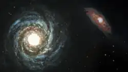 Two spiral galaxies, one of which has a very bright center