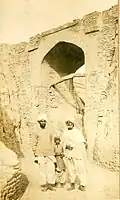 Two Sindhi men and a boy in Sindhi Suthan/Salwar, Pehran, Patka, Loi (Sindhi shawl), and cap and jacket