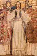 St. Kateri Tekakwitha, surrounded by American saints and missionaries, extends her hands in prayer.