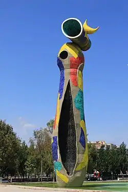 Dona i Ocell, by Joan Miró, 1983, glazed tile mosaic, Barcelona, Spain[78]