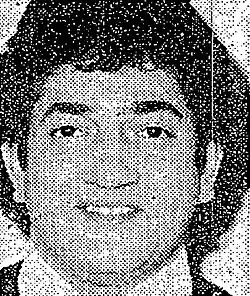 A full-face black and white picture of Joe Johnson slightly smilingf