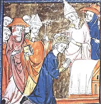 A medieval depiction of the coronation of the Emperor Charlemagne in 800&nbsp;AD wearing royal blue. The bishops and cardinals wear Tyrian purple, and the Pope wears white.