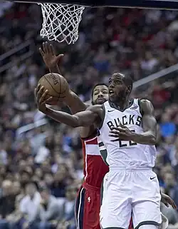 Khris Middleton of the Milwaukee Bucks shooting a layup