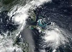 A satellite image of Hurricane Marco and Tropical Storm Laura on August 23, 2020.