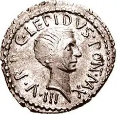 Coin with face and inscription