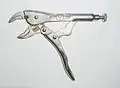 The toggle lock of many lever-action rifles is similar to the mechanism of locking pliers. The pliers lock when the toggle mechanism is pushed over-centre.