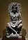 Maitreya, with Kushan devotee couple. 2nd century Gandhara.