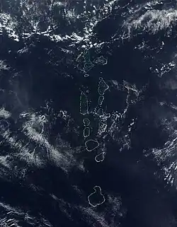 NASA satellite image of some of the atolls of the Maldives, which consists of 1,322 islands arranged into 26 atolls