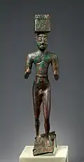 Man carrying a box, possibly for offerings. Metalwork, ca. 2900–2600 BC, Sumer. Metropolitan Museum of Art.