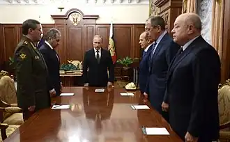 Russian president Vladimir Putin attending a meeting of investigators of the crash