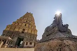 Monolithic Nandi statue at the eastern end of Virupaksha Bazaar, Hampi.