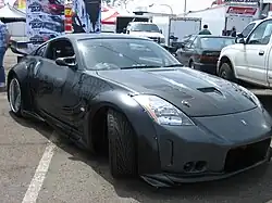 Nissan 350Z Driven by Takashi (D.K.) in the 2006 movie "The Fast and the Furious: Tokyo Drift", The car is equipped with a Veilside Fortune III widebody kit and ghost graphics designed by the French artist SHA DO with Art Factory Graphics.