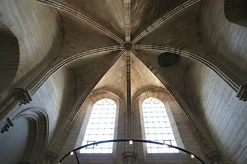 Circular utility door (right of center) in the ceiling below the north tower made for raising and lowering bells[157]