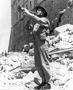 Emil Czech&nbsp;[pl], a Polish bugler, plays the Hejnał mariacki, announcing the victory