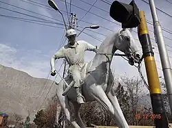 Statue of a Polo player at Jutial; Polo is played annually at the Shandur Polo Ground.