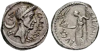 Ancient Roman coin depicting Julius Caesar on the obverse and Venus holding a scepter on the reverse