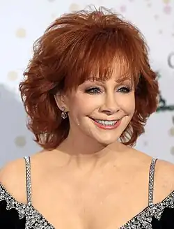 A headshot of singer Reba McEntire.