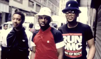 Run-DMC in 1985. From left to right: Joseph "Run" Simmons, Jason "Jam Master Jay" Mizell, Darryl "D.M.C." McDaniels