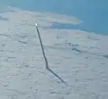 The launch of Endeavour seen from a shuttle training aircraft.